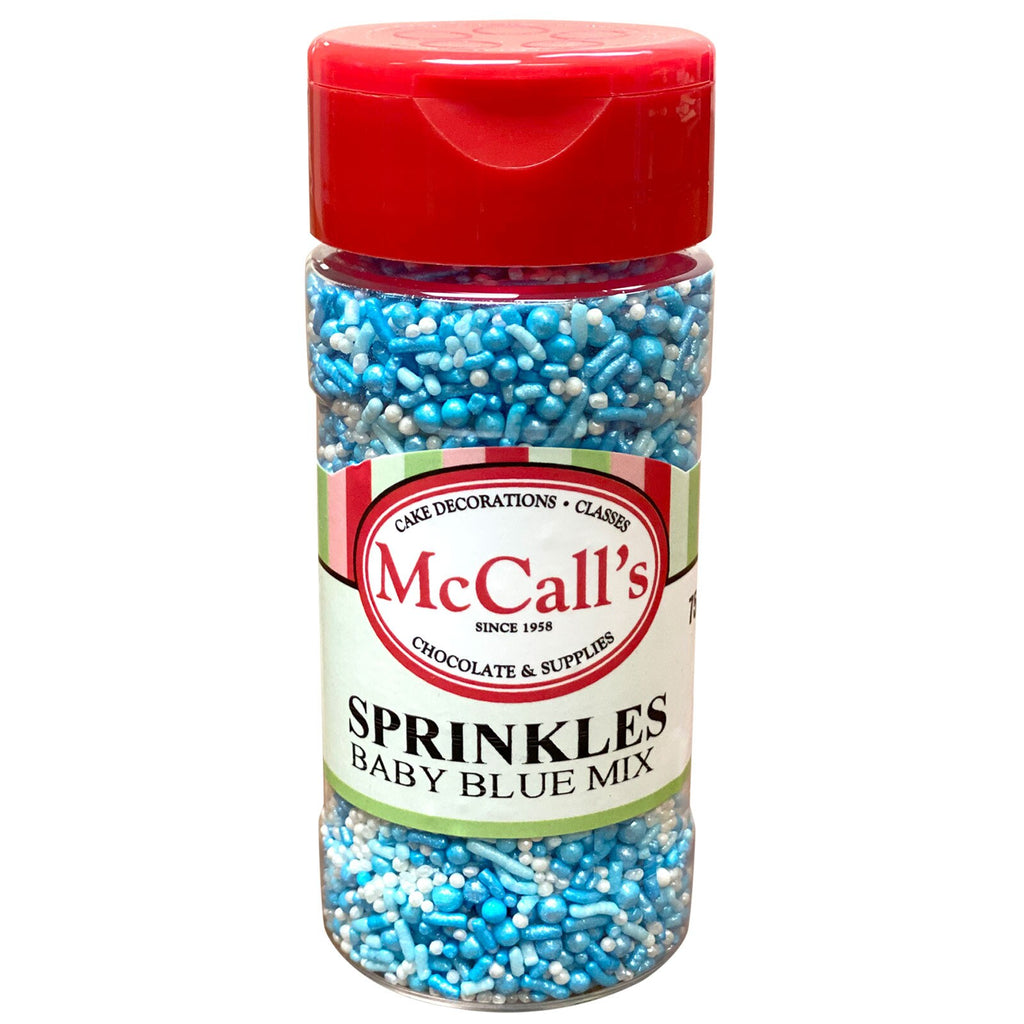 A jar of McCall's baby blue mix sprinkles, perfect for decorating cakes and cookies for baby showers and birthdays.