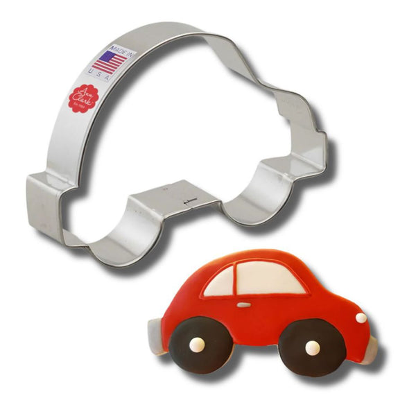 Ann Clark car-shaped cookie cutter and a decorated red cookie, perfect for creative baking and decorating.