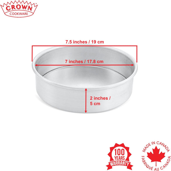 Metal cake pan with dimensions labeled and Crown Cookware branding on a white background, Canadian-made cookware and bakeware, Premium quality aluminum bakeware, Commercial-grade kitchenware made in Canada, Crown Cookware factory in Toronto, Professional baking pans for home and business, Durable cake pans made in Canada, High-performance cooking tools for chefs, 7x2 aluminum cake pan