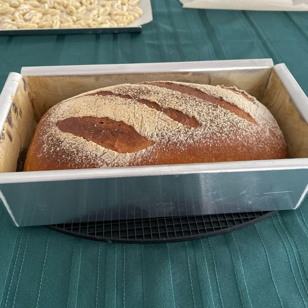 LOAF PAN (4 X 13 X 4 INCH) - Freshly baked bread inside the food-grade aluminum loaf pan - Crown Cookware
