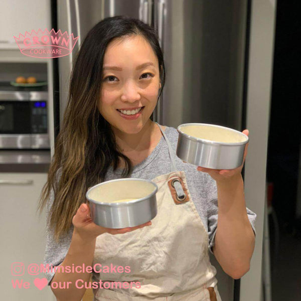 Round cake pan, 2 inches deep, high quality, durable, food-grade aluminum baking pan (Crown Customer holding finished cake) - Crown Cookware